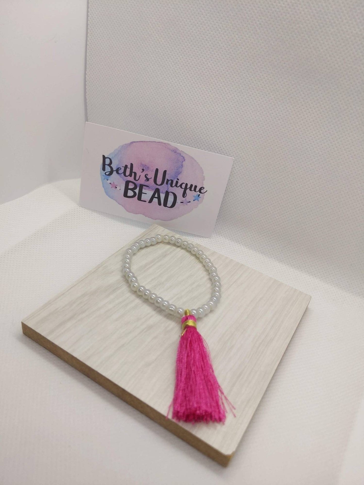 Beaded bracelet, tassel bracelet, gold bangle, pink bangle, white round beads, expandable arm candy