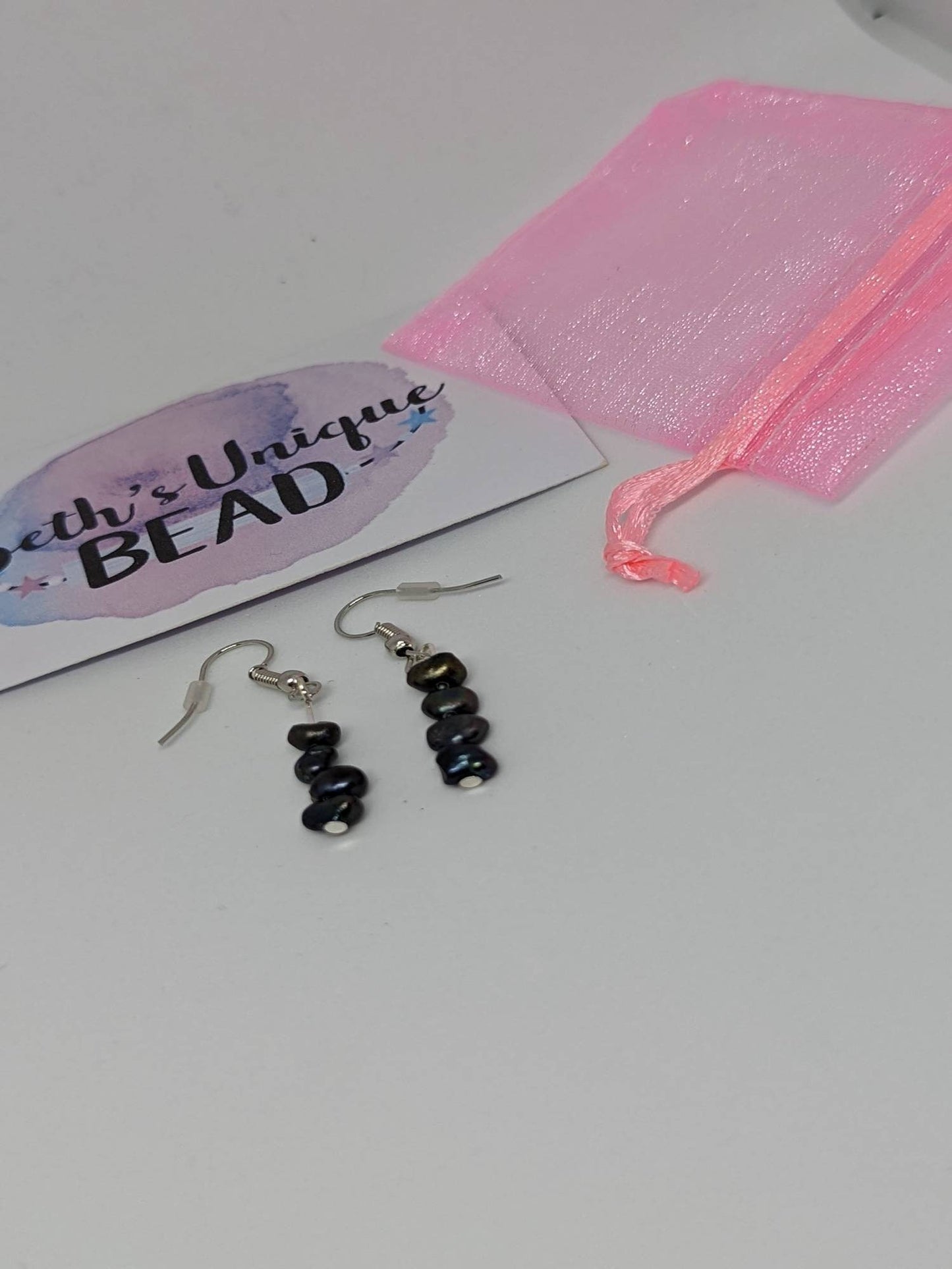dark blue pearls, freshwater pearls, dainty earrings, delicate bracelet, June birthstone