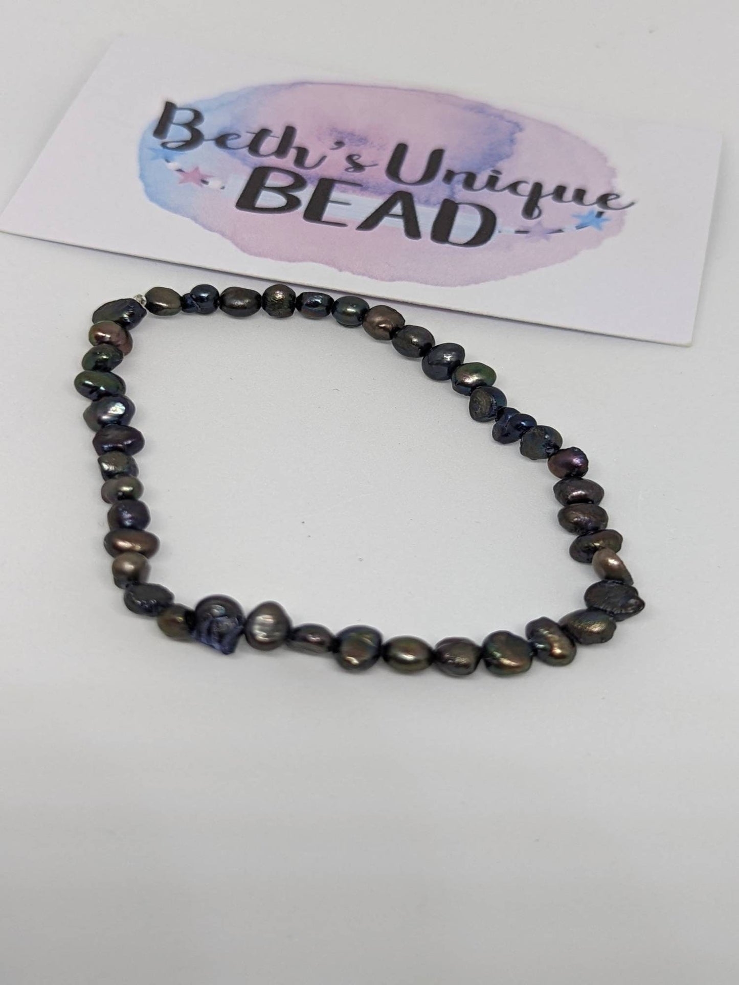 dark blue pearls, freshwater pearls, dainty earrings, delicate bracelet, June birthstone