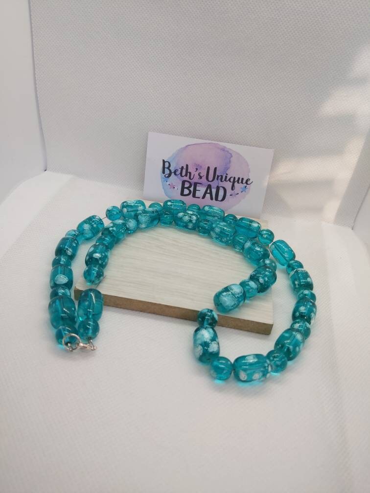 Glass jewellery/glass necklace/glass bracelet/glass earrings/beaded necklace/beaded earrings/beaded bracelet/patterned jewellery/black beads