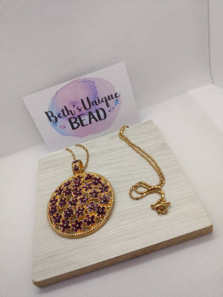 gold plated pendant, round, circle, purple flowers, flowery necklace, statement chain, plants,
