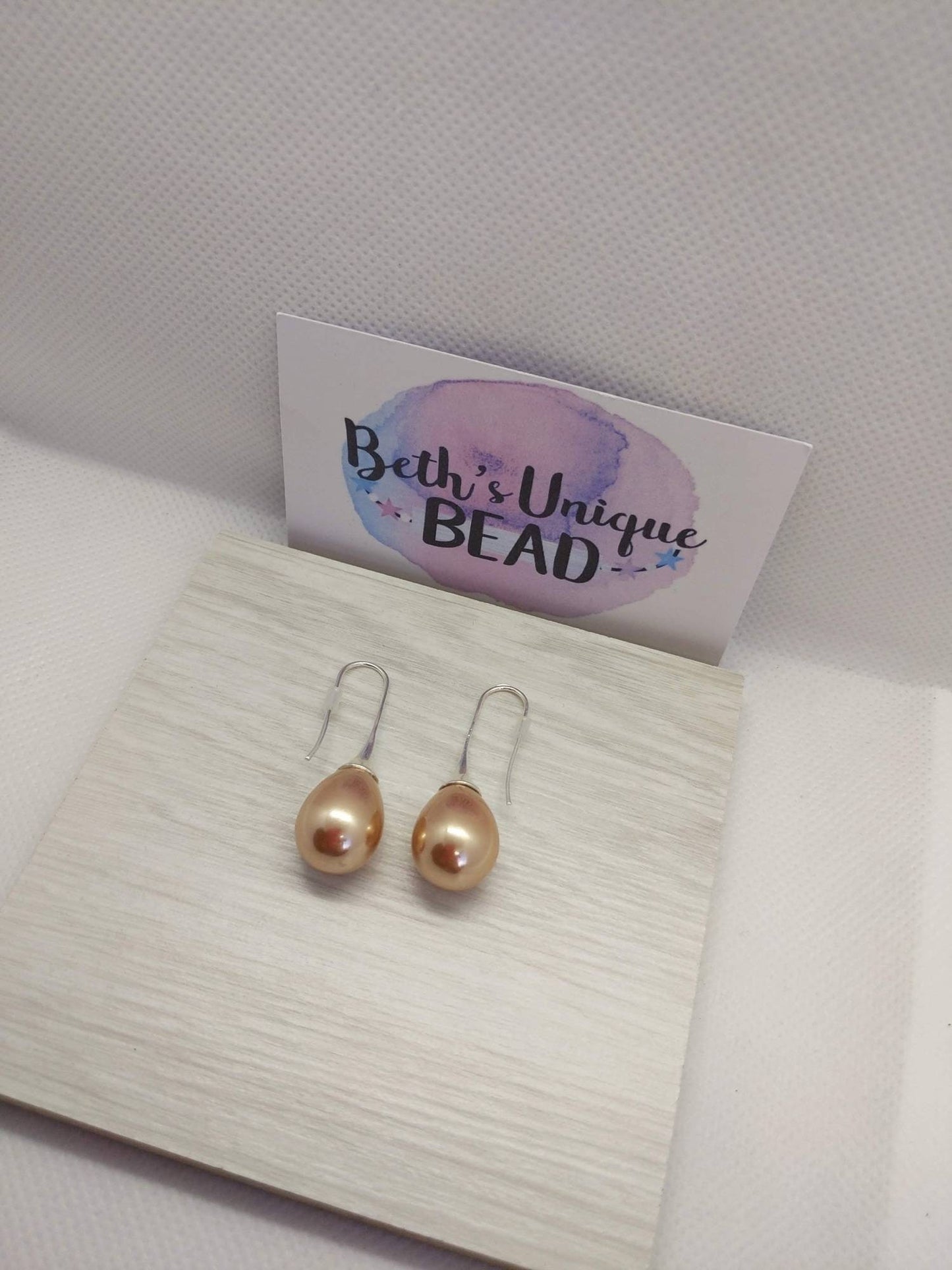 teardrop earrings/silver plated drops/pearl/faux pearl earrings/pearl drop earrings/faux pearl drop/glossy/classy/oval jewellery